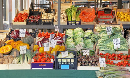 Fresh organic vegetables stall with full cratesの写真素材