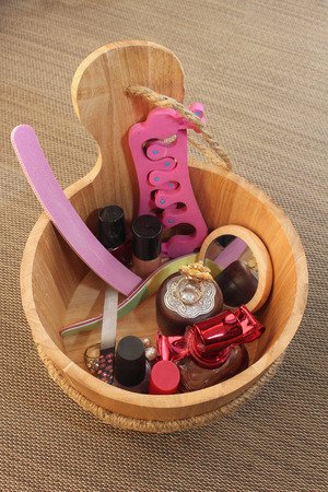 Retro manicure nail set in wooden bucketの写真素材