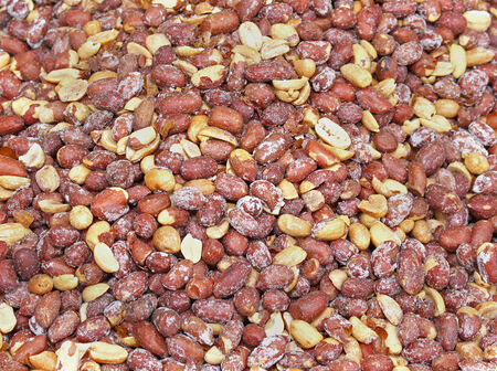 Big pile of fried and salted peanutsの写真素材