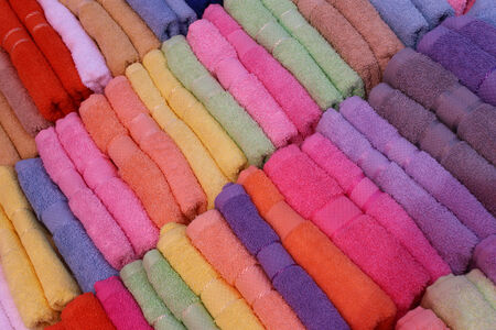 Carefully arranged thick cotton bright color towelsの写真素材