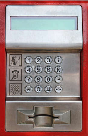 Digital keypad detail on public payphone with card slotの写真素材