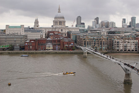 LONDON, UNITED KINGDOM - November 24: Famous London cityscape with Thames river and Millennium bridge in London, United Kingdom, November 24, 2013 Rainy day over Thames river with landmark viewsのeditorial素材