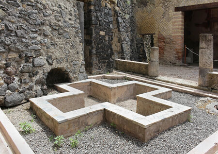 Ancient archaeological remains with cracked stone wallの写真素材