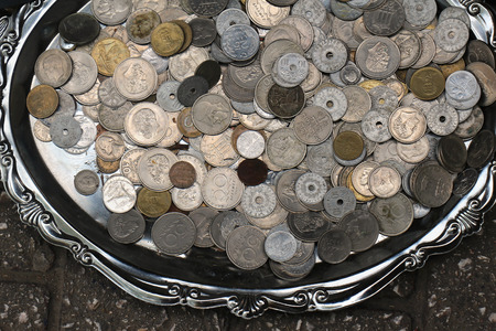 Old silver coins pile at flea marketの写真素材