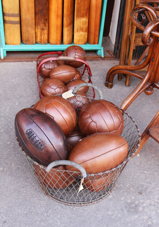 Old vintage brown leather sport balls pileの写真素材