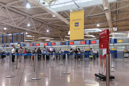 ATHENS, GREECE - May 05: Check in counters at Athens International Airport Eleftherios Venizelos with passengers waiting in line in Athens, Greece - May 05, 2015; Eleftherios Venizelos is the primary civilian airport that serves the city of Athens and theのeditorial素材