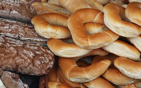 Freshly baked bread and buns pile sold on market