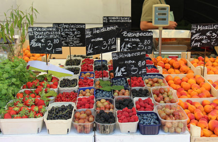 Attractive beautiflully decorated fresh organic fruit stsndのeditorial素材