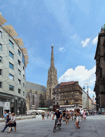 VIENNA, AUSTRIA - JULY 12, 2015; One of the most famous squares St. Stephen platz in Vienna, Austria - July 12, 2015: Tourists walking through St. Stephen platz in the Vienna city centreのeditorial素材