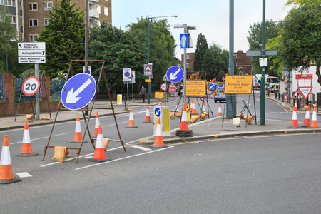 LONDON, UNITED KINGDOM - June 20: Traffic signs on the street in Westminster signaling diversion...