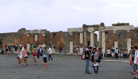 POMPEII, ITALY - June 25, 2014; Famous UNESCO heritage antique ruins in Pompeii, Italy - June 25, 2014; Large square with remains of destroyed ancient city Pompeii with tourists walking aroundのeditorial素材