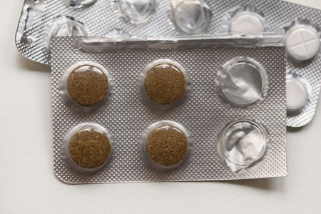 Over the counter drugs tablets in silver blistersの写真素材