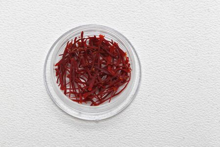 Traditional Moroccan spice saffron on plastic plateの写真素材