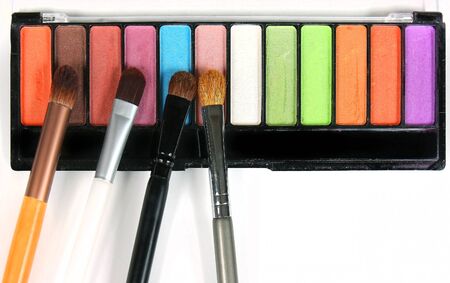 Colorful eye shadows palette with make up brushesの写真素材
