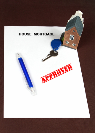 House mortgage approved concept with key on a paperの写真素材