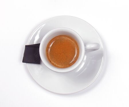 Italian espresso coffee in small cup on white backgroundの写真素材