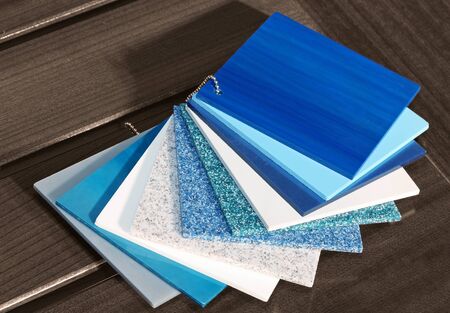 Marble materials tiles color swatches on metal string chainの写真素材