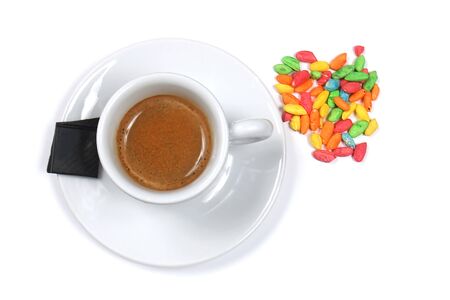 Hot espresso coffee with chocolate on side of plateの写真素材