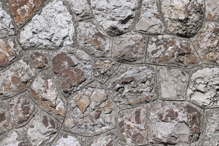 Old grunge rock stone wall texture backgroundの写真素材