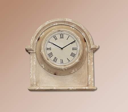 Retro wooden clock hanging  on the wall