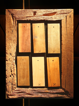 Wood sample rectangle swatches inside wooden frame