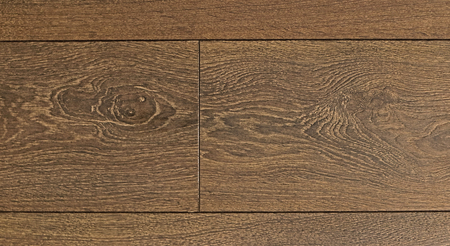 Brown wooden parquet texture with several scratchesの写真素材