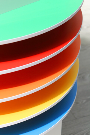 Colorful coating samples on wooden material shelvesの写真素材