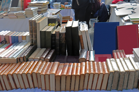 Old books sold on vintage French flea market in Niceの写真素材
