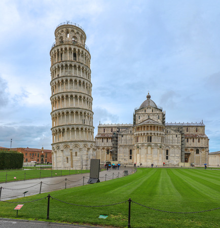 Famous Leaning Tower of Pisa next to cathedral in Italyの写真素材