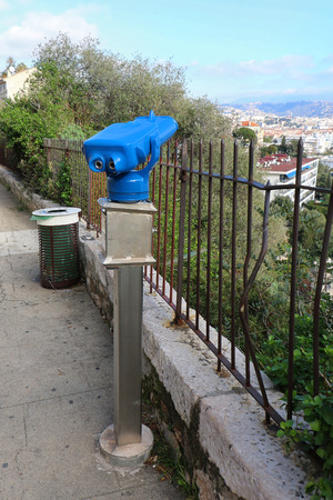 Viewing binoculars on popular tourist spot for admiring local attractions and architectureの写真素材