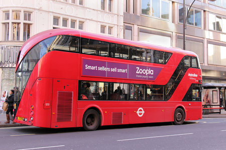 London, UK - February 08: Double decker bus full with passengers inside traditionally used for mass public transport in Londonのeditorial素材