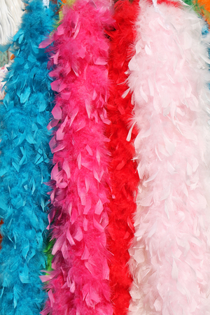 Colorful feathers scarves texture on local marketの写真素材