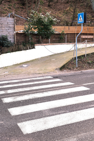 Zebra crossing traffic sign on rural roadの写真素材