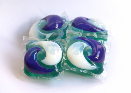 Clothes washing detergent pods on white backgroundの写真素材