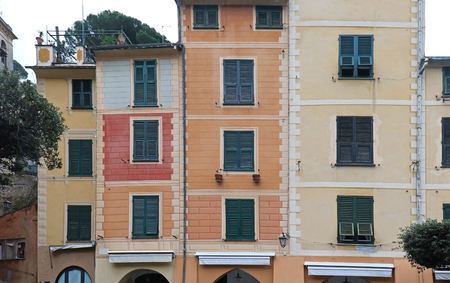 Retro houses exterior with colorful facades and closed windowsの写真素材