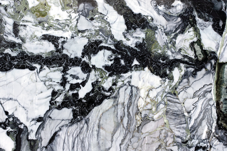 Black marble stone material background with cracked linesの写真素材