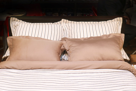 Modern sheets and pillow linens made of cotton and satin materials