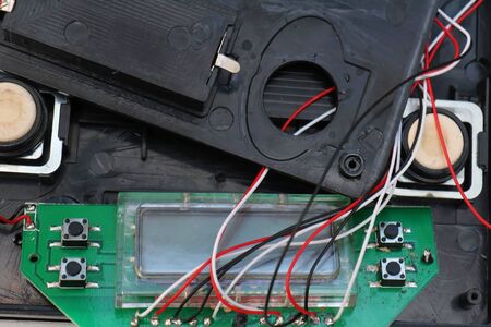 Open circuit board with many chips, wires and display componentsの写真素材