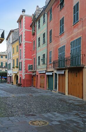 Retro street architecture with colorful facades houses in Italyの写真素材