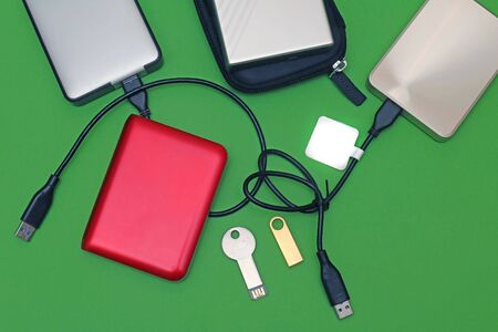 USB memory hard drives and flash cards used in computer industryの写真素材