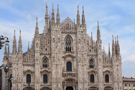 Ancient medieval architecture roof landmark Duomo cathedral in Milanの写真素材