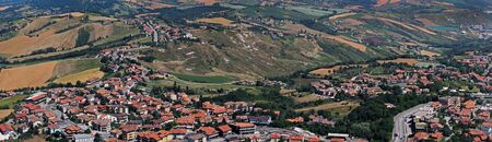 San Marino panorama landscape with houses shot from viewpoint aboveの写真素材
