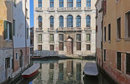 Small bay in one of the Venice canals passagesの写真素材