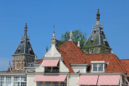 Retro house with red roof tiles in Amsterdamの写真素材