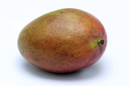 Fresh organic raw mango fruit on white backgroundの写真素材