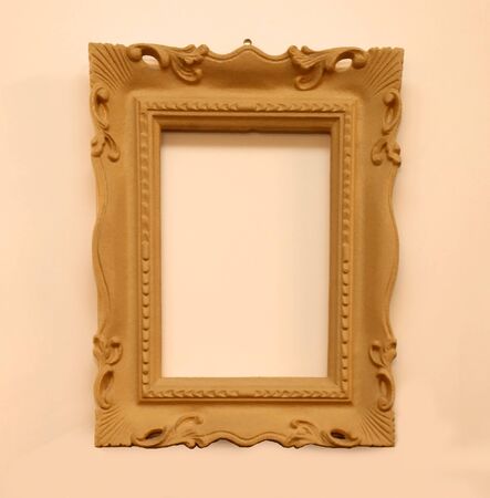 Retro sepia color wooden frame on interior wallの写真素材