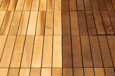 Brown wooden floor pattern tiles in a rowの写真素材