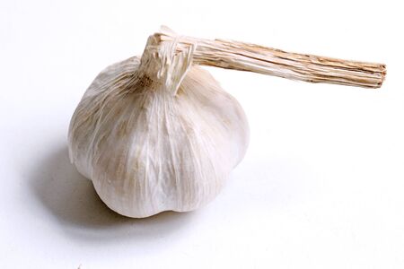 Dry fresh organic garlic vegetable on white backgroundの写真素材