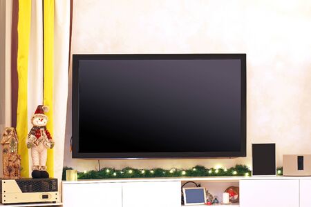 Large television screen on wall  of modern interiorの写真素材