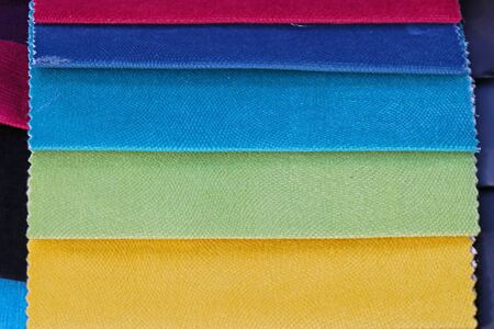 Colorful textile material samples in a rowの写真素材
